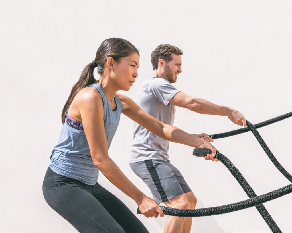 man and woman exercising